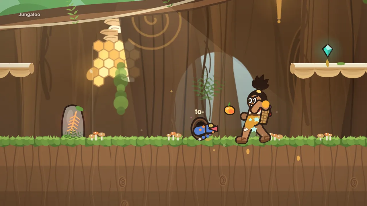 Inside a great hollow tree, Tavo throws a fruit at a blue, orange-spotted gecko poking out of a knot-hole, a glowing honeycomb on the wall behind them