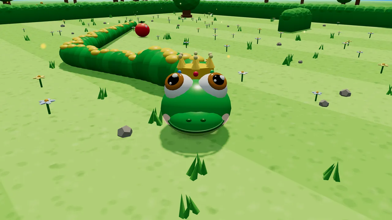 Milo, a green snake with big brown eyes and a row of yellow spots down his back, faces the camera wearing a small gold crown with six points and a red gem in front, his long body curving back across a sunny meadow full of grass tufts, little white and yellow flowers and gray pebbles toward a red apple, with a green hedge and trees at the back