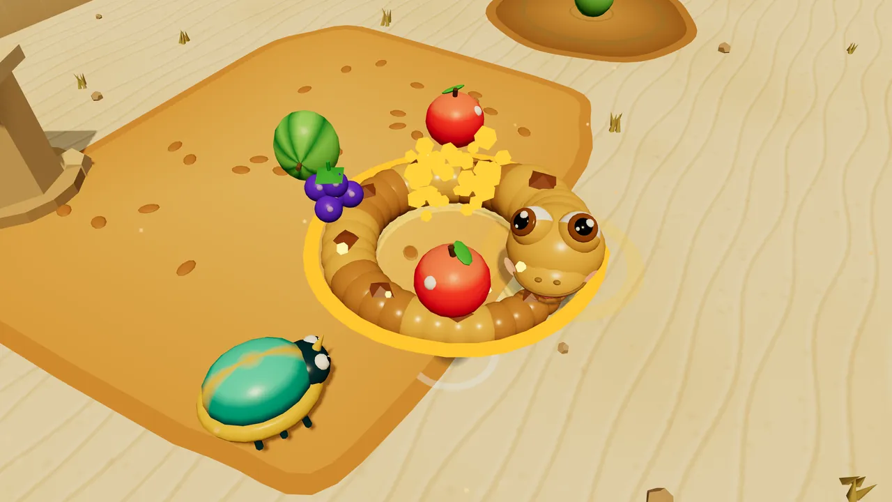 Seen from above, Sandy lies curled into a tight ring on a patch of orange sand, with a glowing golden outline around the loop and a burst of yellow sparkles; red apples, a bunch of purple grapes and a green melon have spilled around and inside the ring, and a teal scarab beetle with a little horn and a yellow rim scuttles by at the bottom left