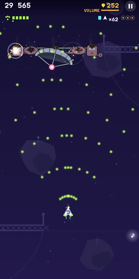 The Jammer Dish over Pirate Cove in the middle of its break-up: the gray dish hangs tilted, its antenna masts gone, scorched black holes on both speaker drums and along the beam, a white star of a blast at its left end and a faint ring at its right, while arcs of green shots keep rising toward it from Volta’s ship at the bottom and no enemy bullets are left on screen